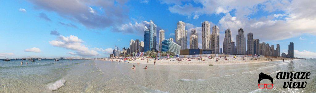 Panoramic view over beach and skyline of Marina district in Dubai